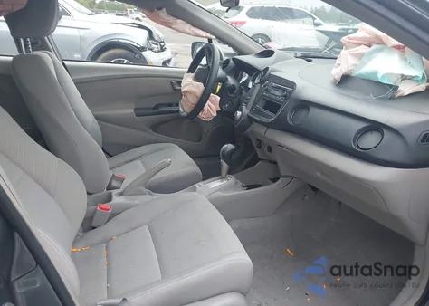 2011 Honda Insight z USA, uszkodzony, nr VIN JHMZE2H33BS003340